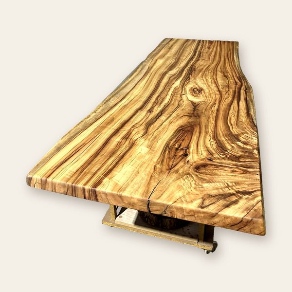 Long golden live-edge slab table