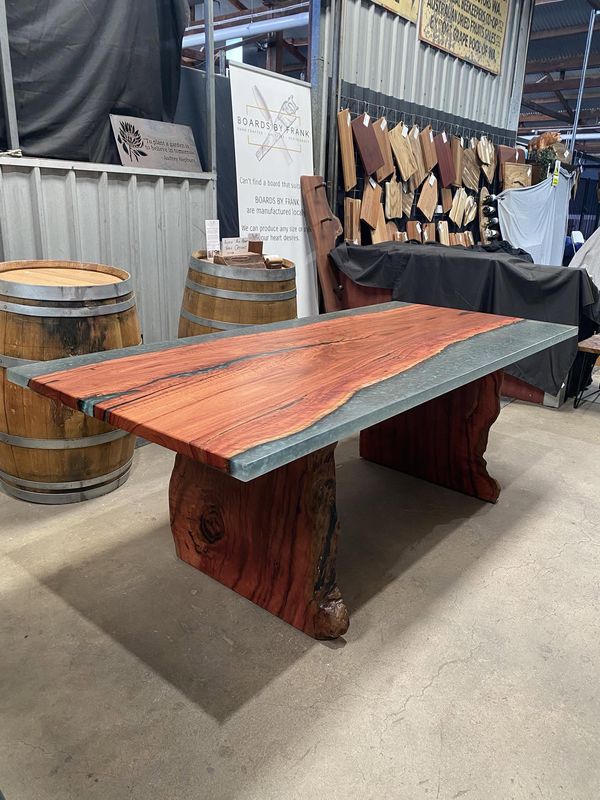 Jarrah table with grey resin edges, slab base, by wine barrels