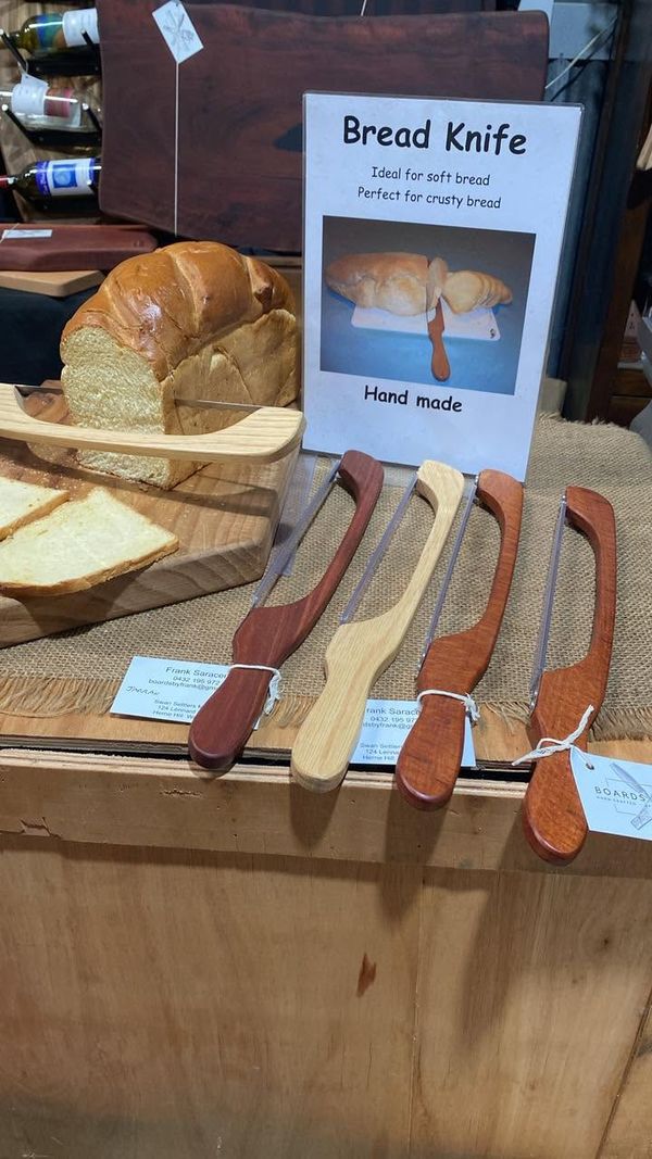 Handmade timber bread knives with sign