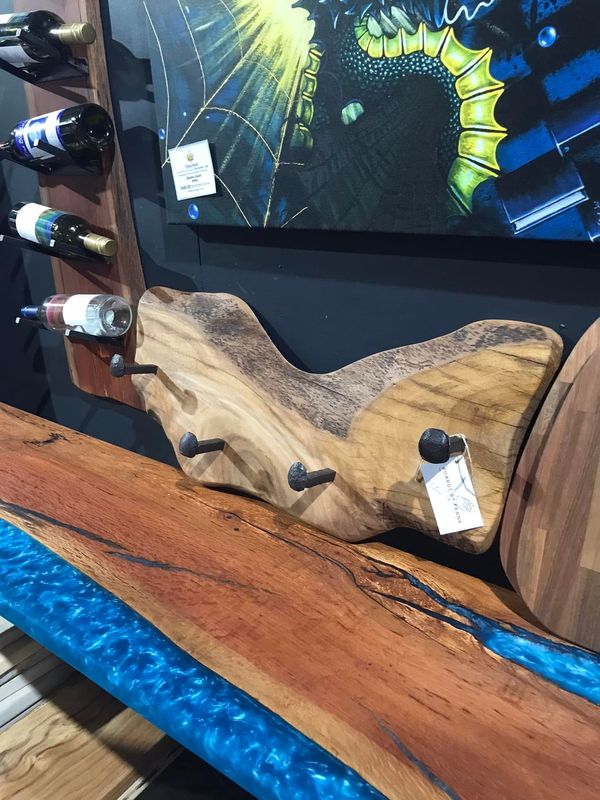 Live-edge wine rack and resin bench