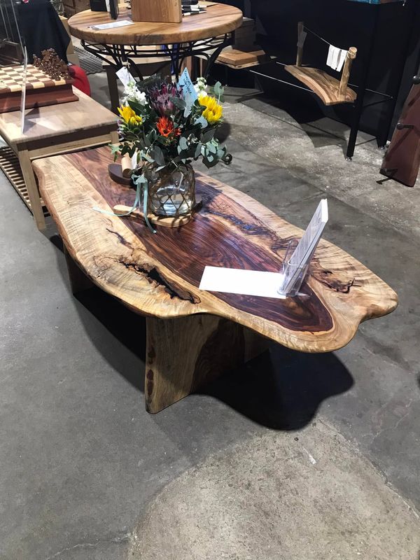 Live-edge coffee table with flowers