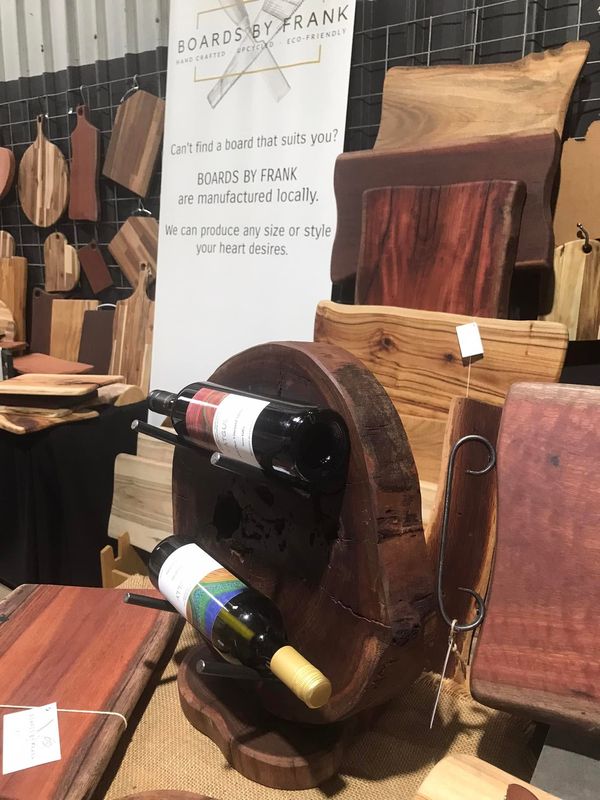 Round slab wine rack with bottles