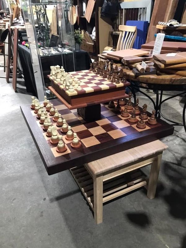 Chess table with raised board and pieces