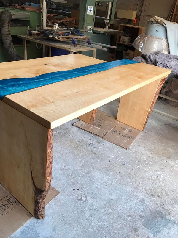 Blonde waterfall desk with blue resin river