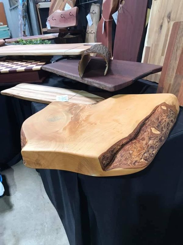 Pale live-edge board with burl edge