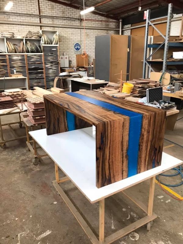 Waterfall coffee table with blue resin, workshop