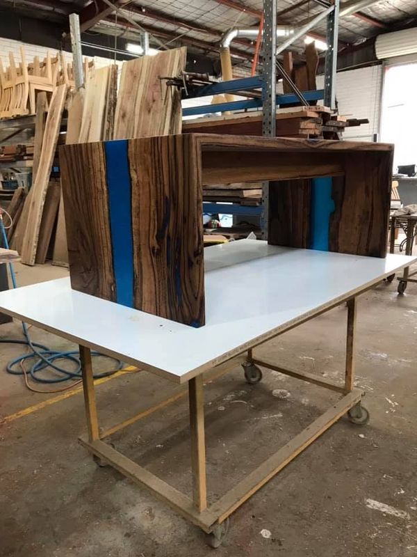 Front view of the waterfall coffee table with blue resin