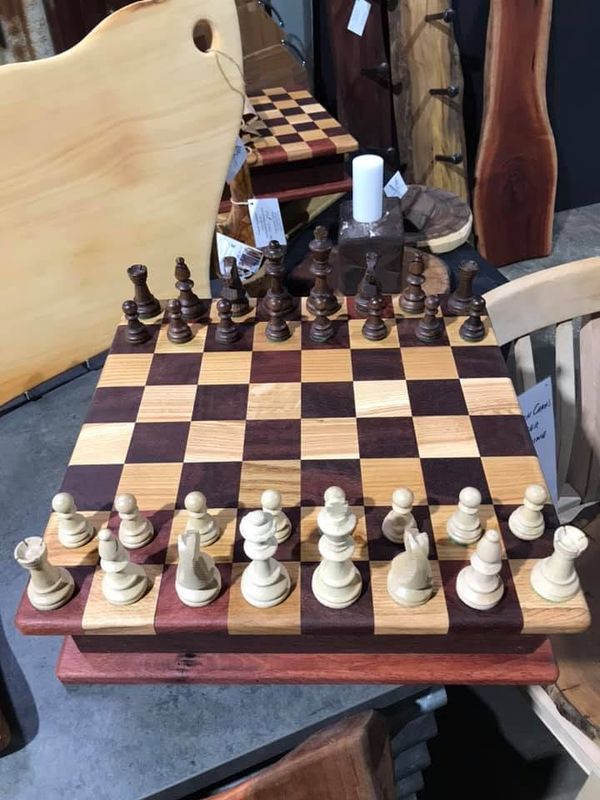 Timber chess board with the pieces set out