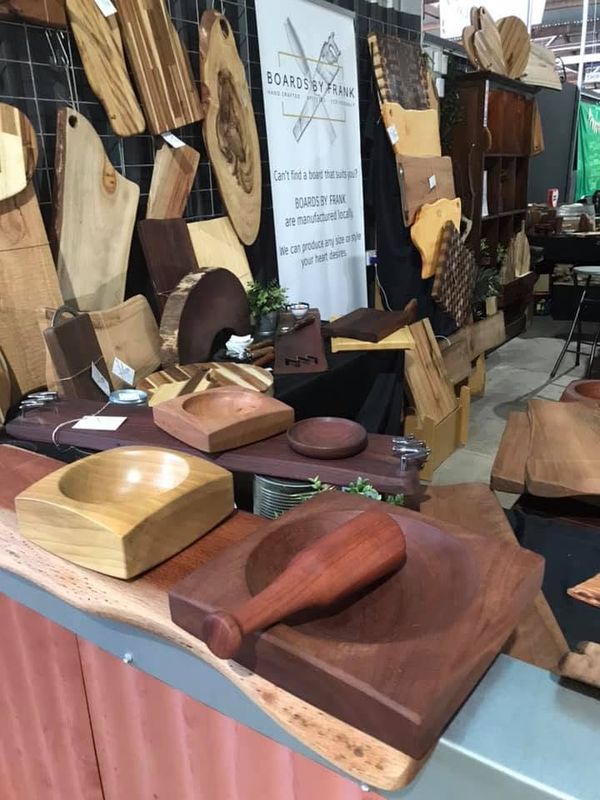 Stall with turned bowls and boards