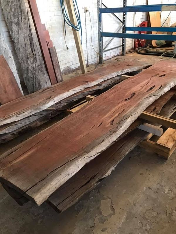 Stack of raw jarrah slabs