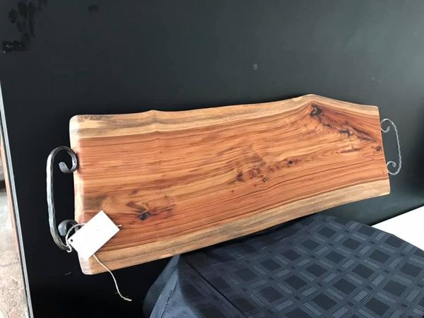 Board with wrought-iron handles