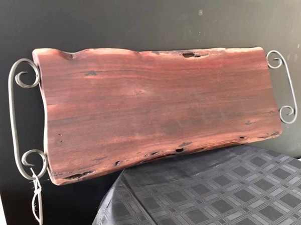 Pink jarrah board with scroll handles
