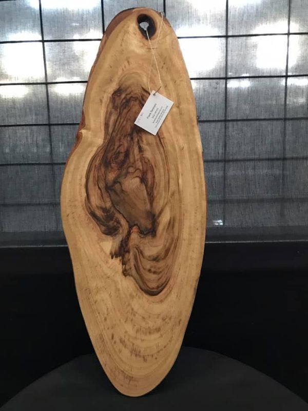 Long oval board with dramatic figure